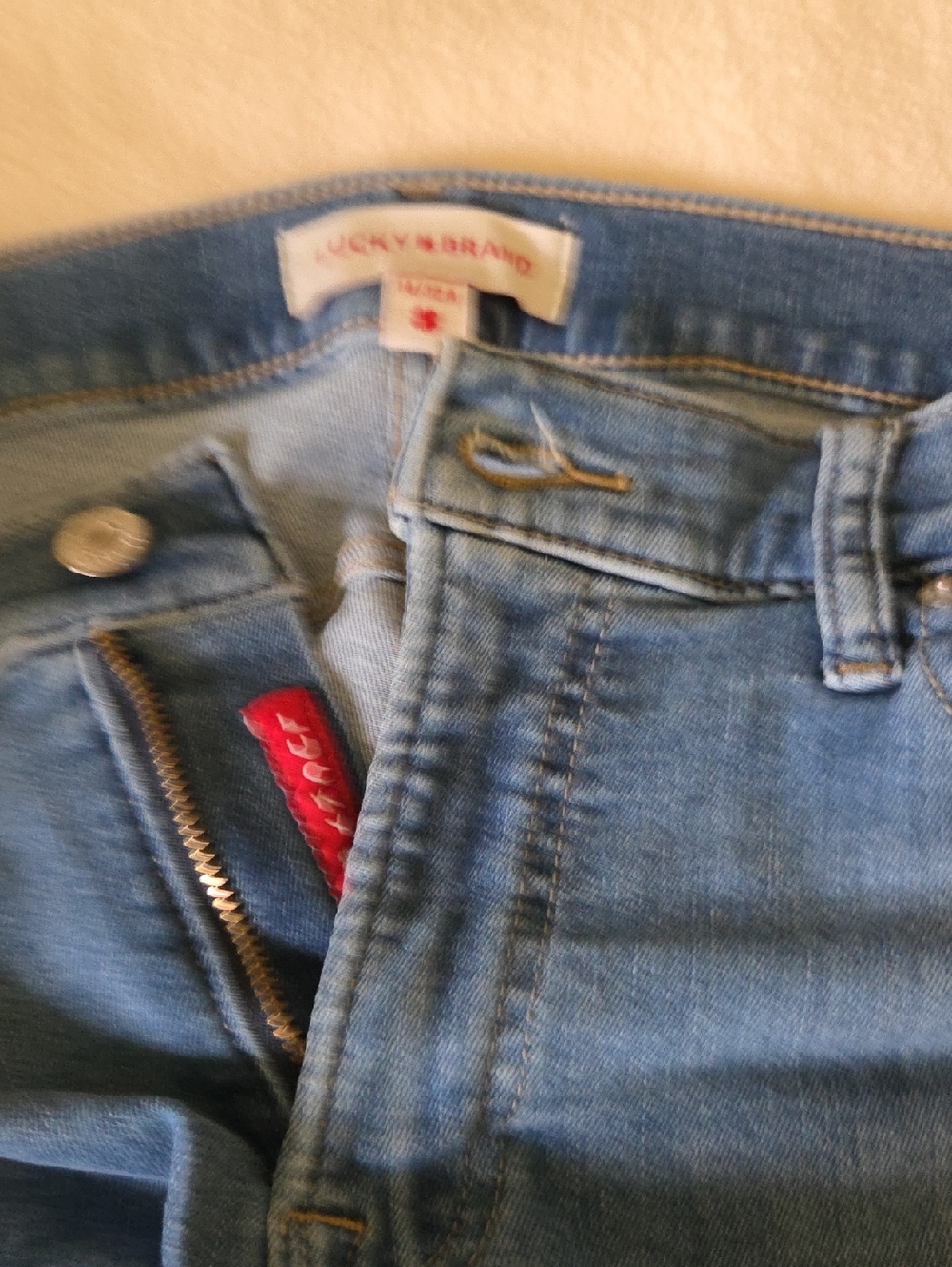 Lucky Brand Women's Light Blue Boot Cut Jeans with Red Tag Detail
